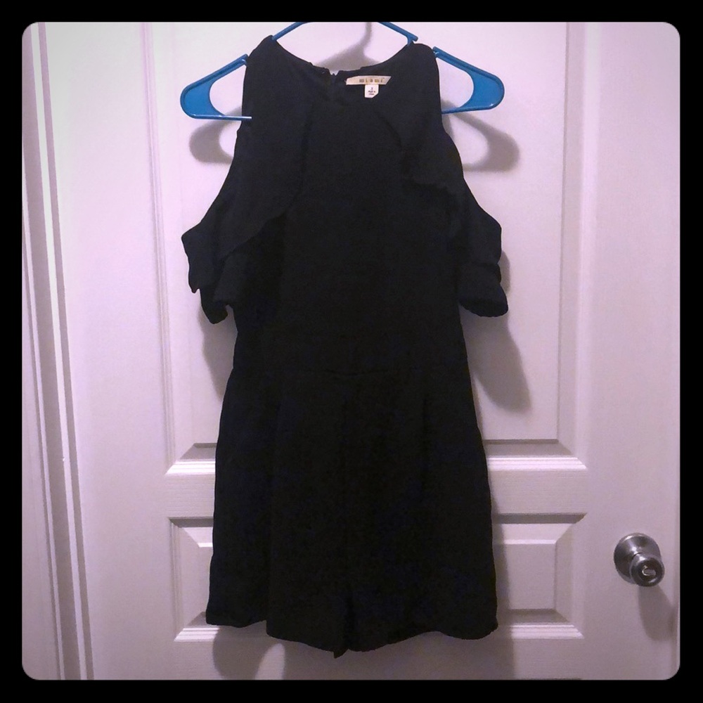 Miami Black Romper with beep shoulder sleeve.